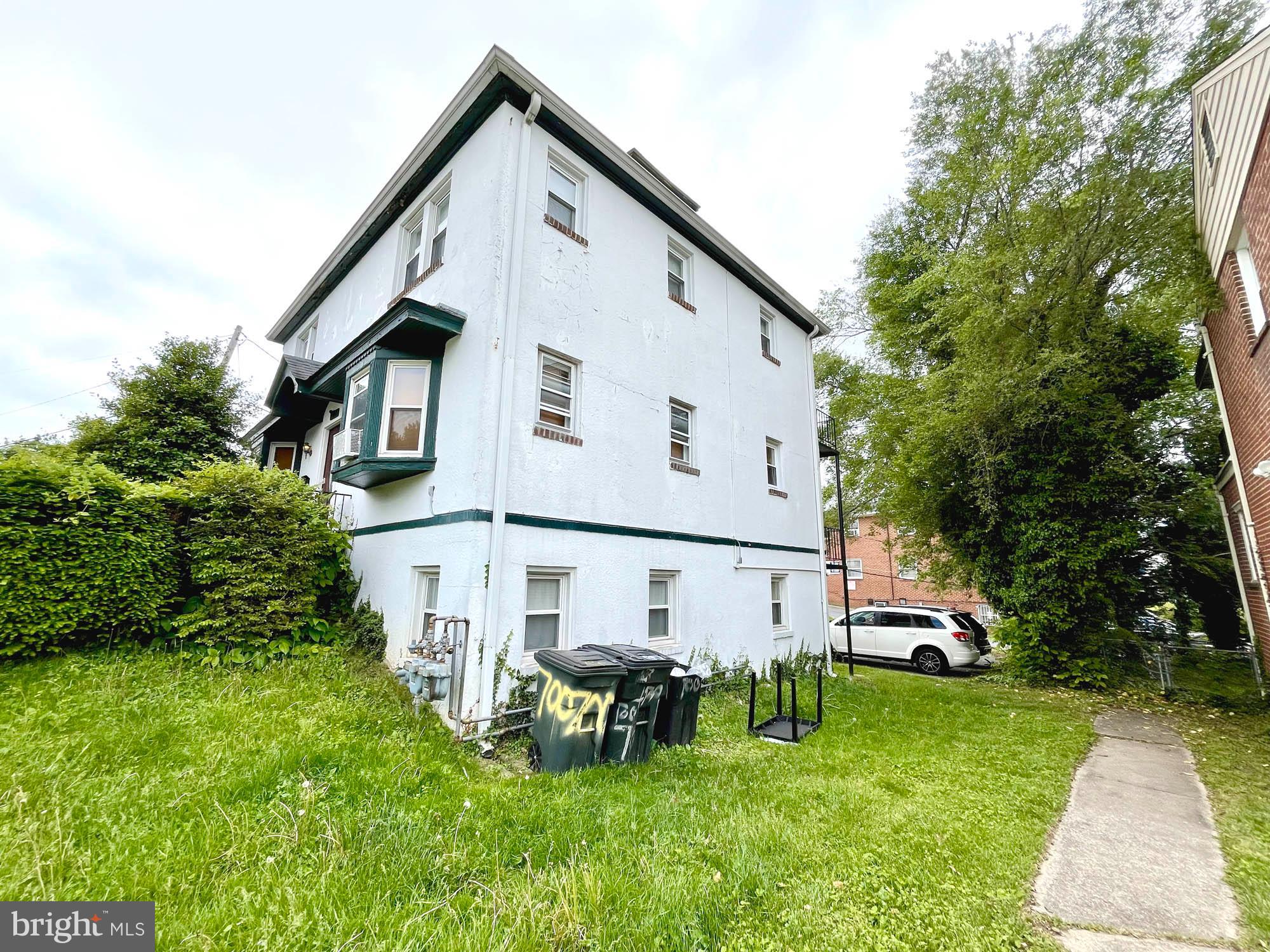700 Charing Cross Road Baltimore, MD 21229 - Photo 3 of 7 a view of backyard of house with green space