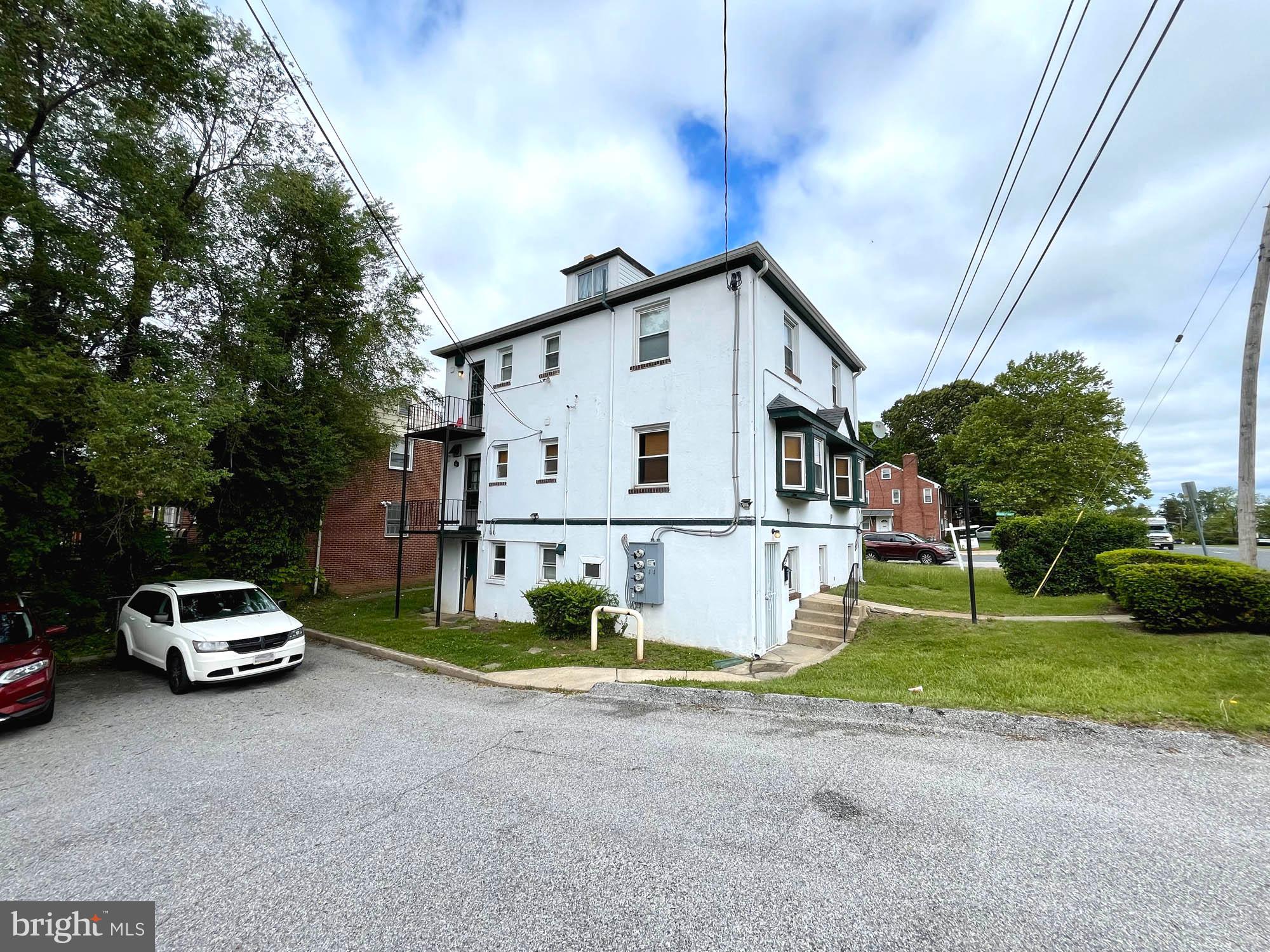 700 Charing Cross Road Baltimore, MD 21229 - Photo 5 of 7 a view of a car parked in front of house