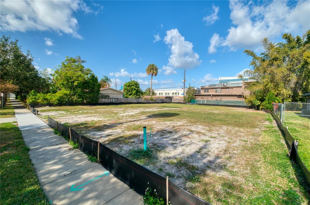 307 Harvard Street Orlando, FL 32804 - Photo 5 of 13 a view of a swimming pool with an outdoor space and seating area