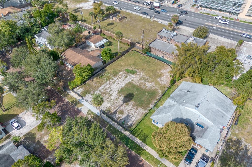 307 Harvard Street Orlando, FL 32804 - Photo 8 of 13 an aerial view of a house with a yard and lake view