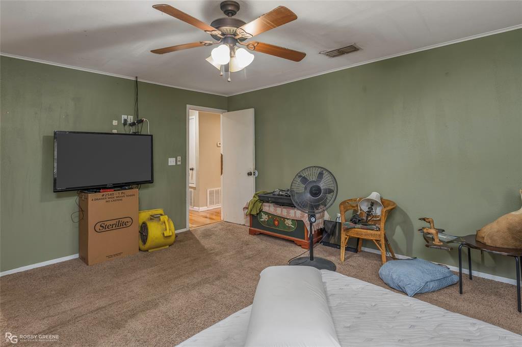 158 Edwards Road Doyline, LA 71023 - Photo 15 of 28 a living room with furniture and a flat screen tv