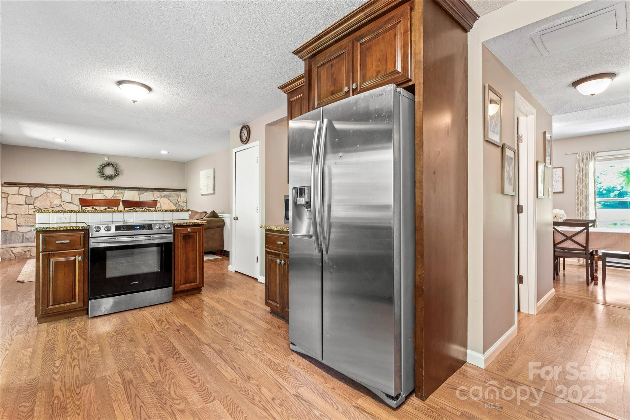 335 Bob White Run Salisbury, NC 28147 - Photo 11 of 41 a kitchen with a stove and a refrigerator