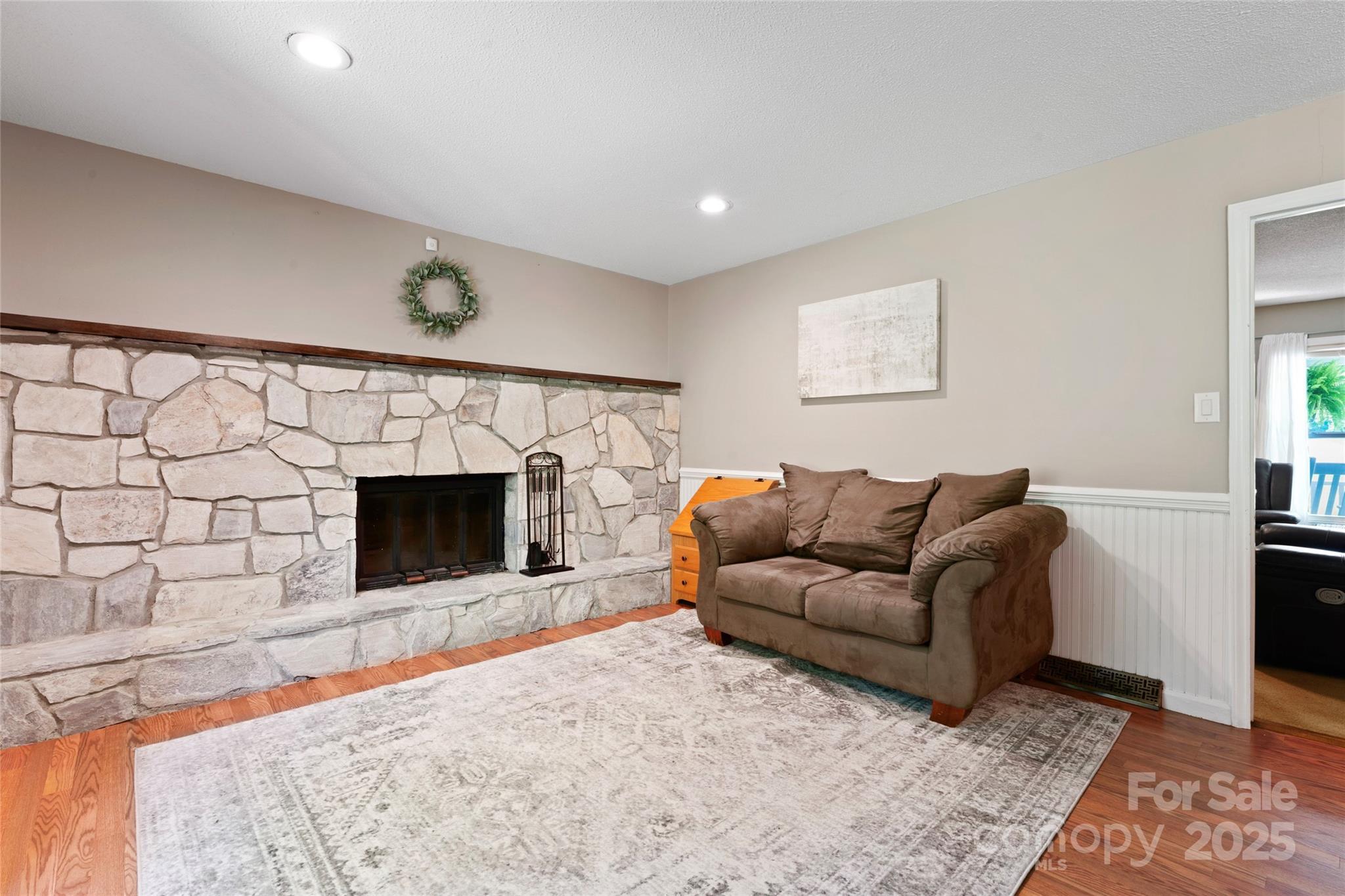335 Bob White Run Salisbury, NC 28147 - Photo 15 of 41 a living room with furniture and a fireplace