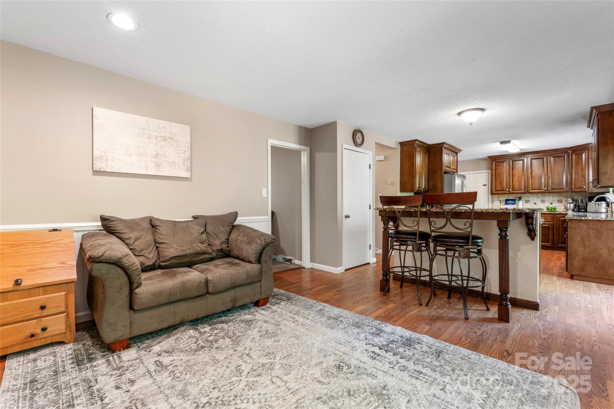 335 Bob White Run Salisbury, NC 28147 - Photo 16 of 41 a living room with furniture and kitchen view