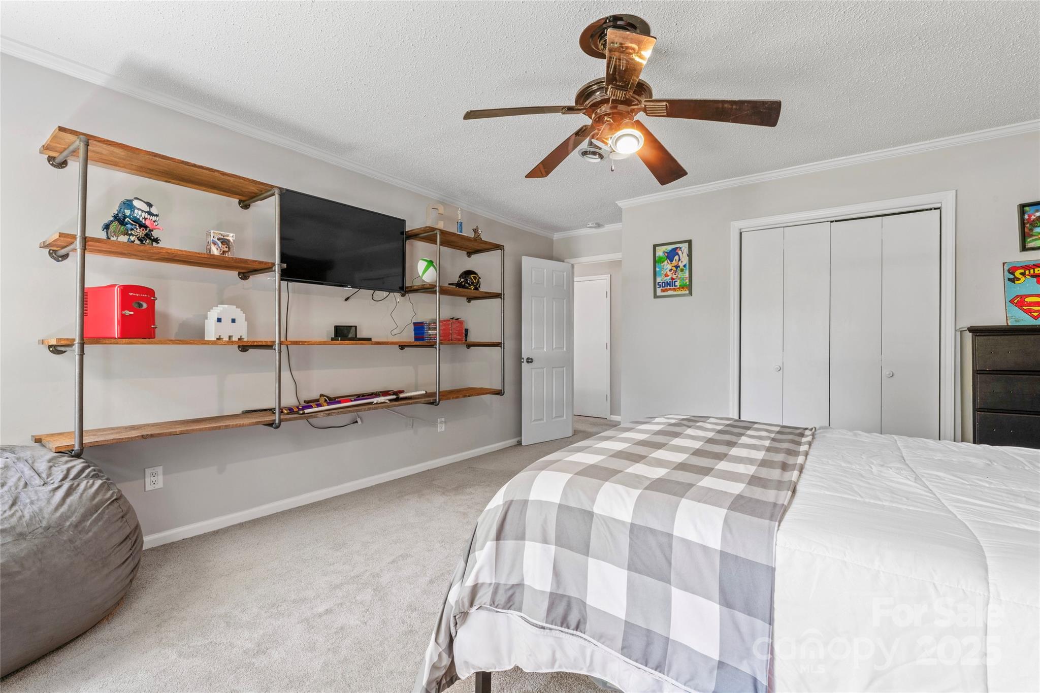 335 Bob White Run Salisbury, NC 28147 - Photo 21 of 41 a bedroom with a bed and a flat screen tv