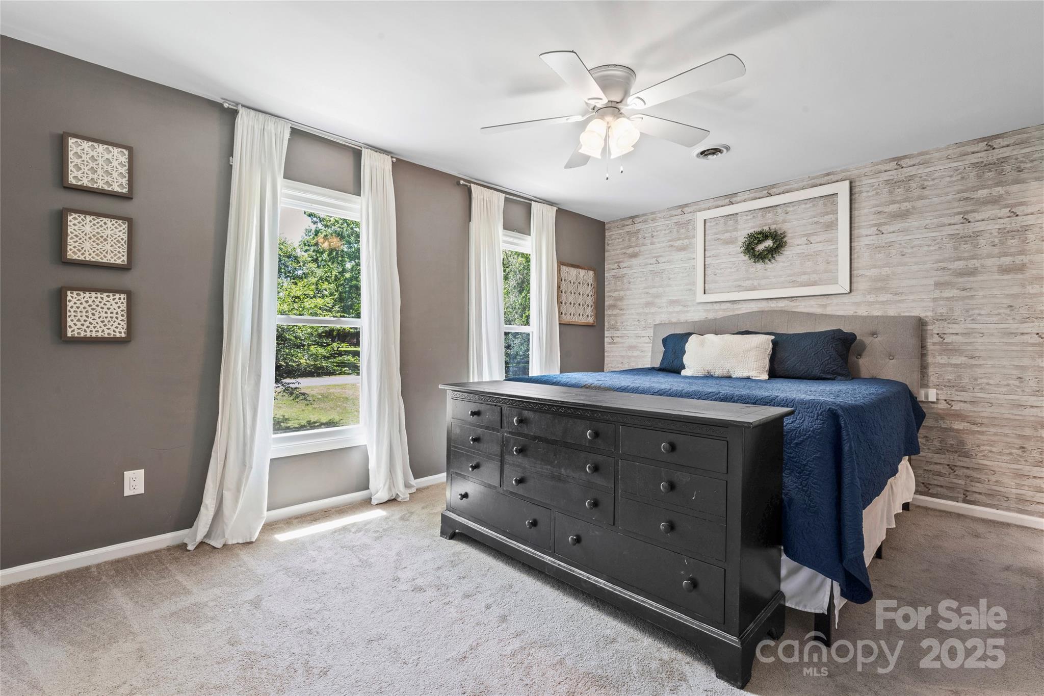 335 Bob White Run Salisbury, NC 28147 - Photo 27 of 41 a bedroom with a bed and a window