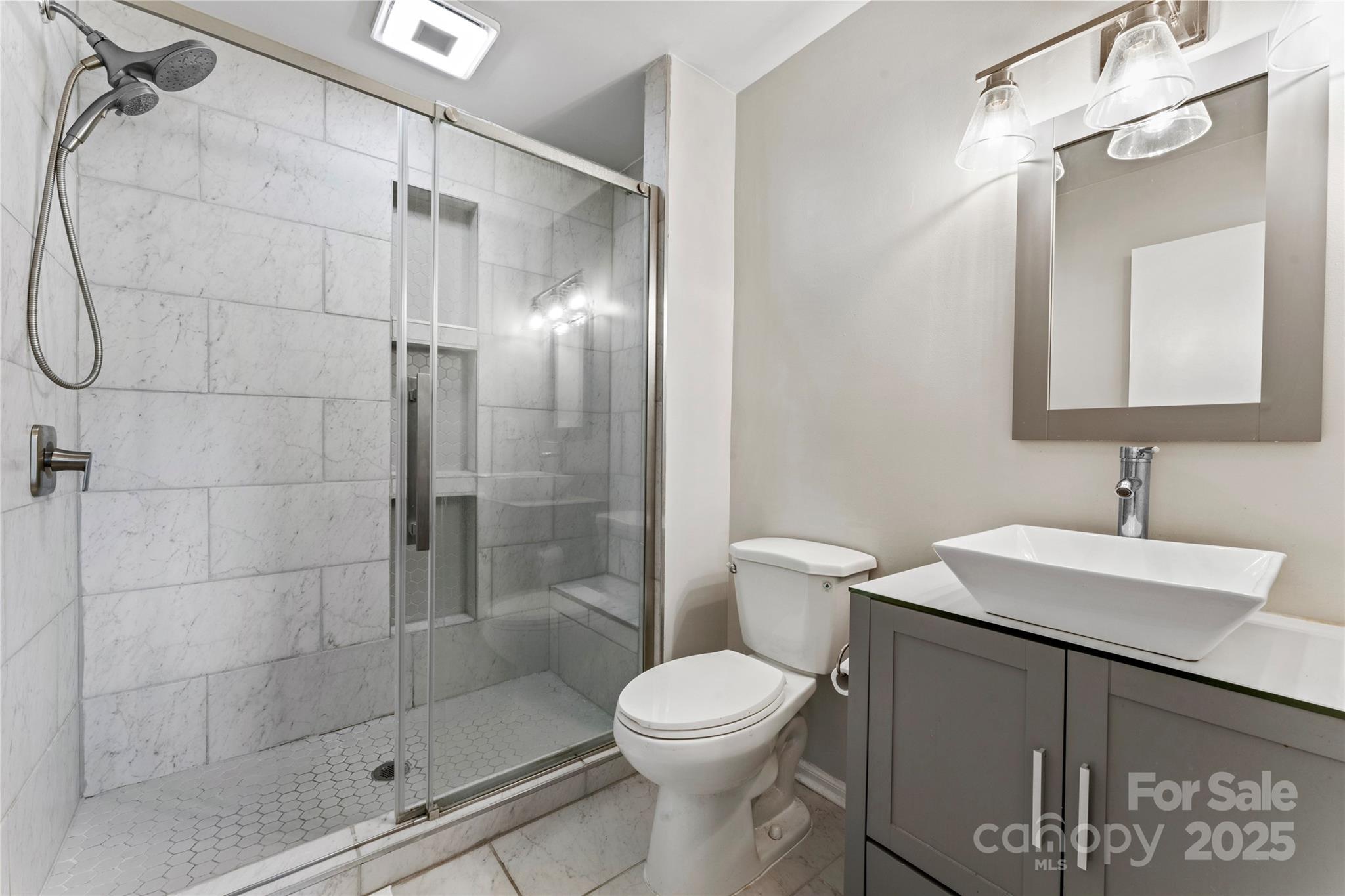 335 Bob White Run Salisbury, NC 28147 - Photo 30 of 41 a bathroom with a sink toilet and shower