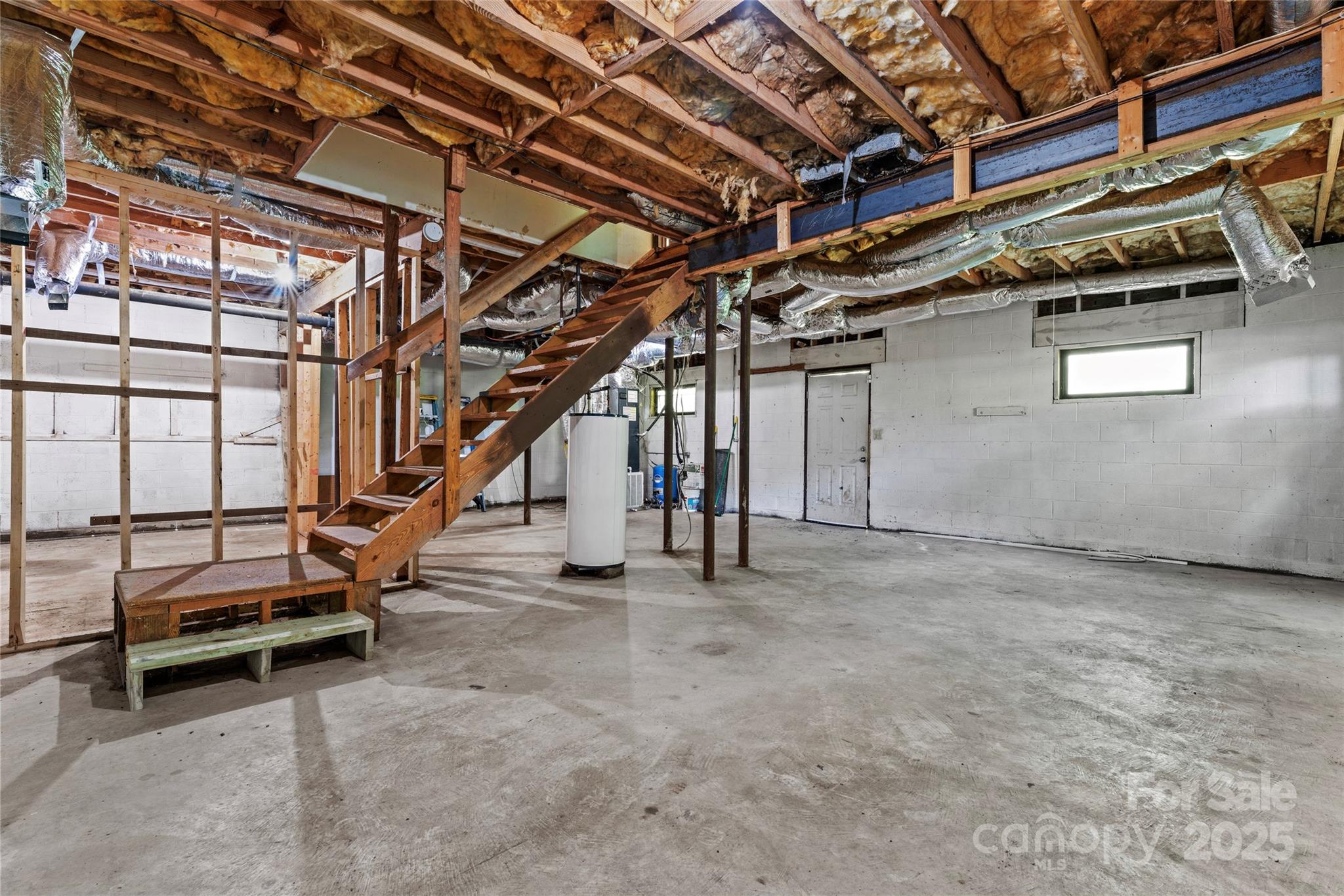 335 Bob White Run Salisbury, NC 28147 - Photo 31 of 41 a view of an empty room with stairs