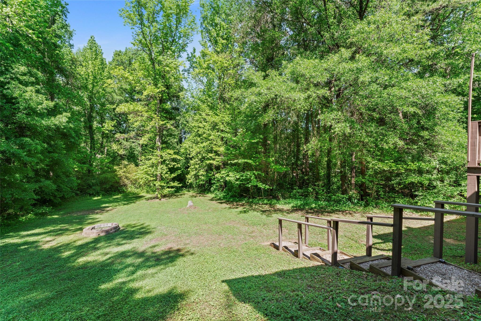 335 Bob White Run Salisbury, NC 28147 - Photo 36 of 41 a view of a bench in a garden