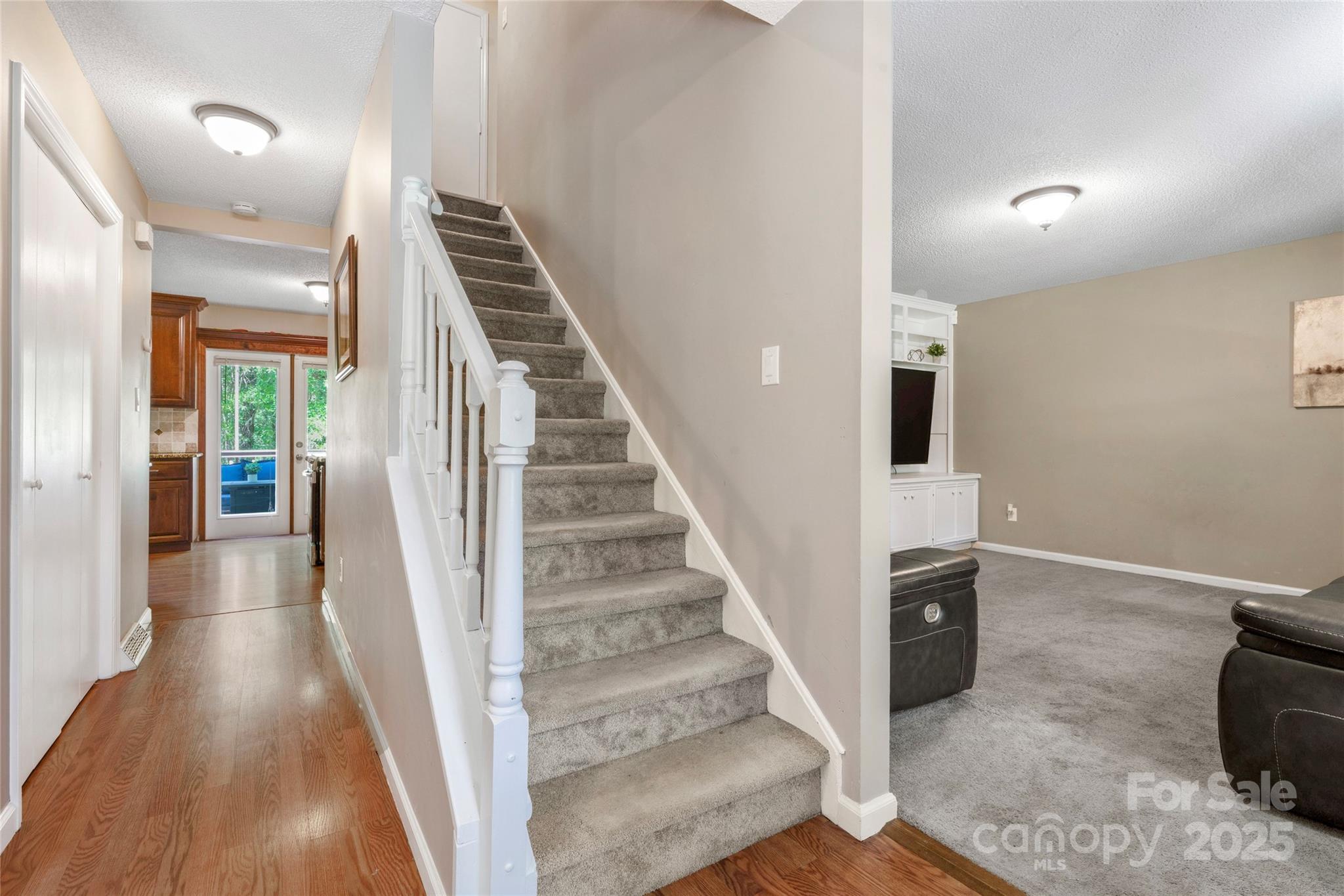 335 Bob White Run Salisbury, NC 28147 - Photo 5 of 41 a view of entryway and hall with wooden floor