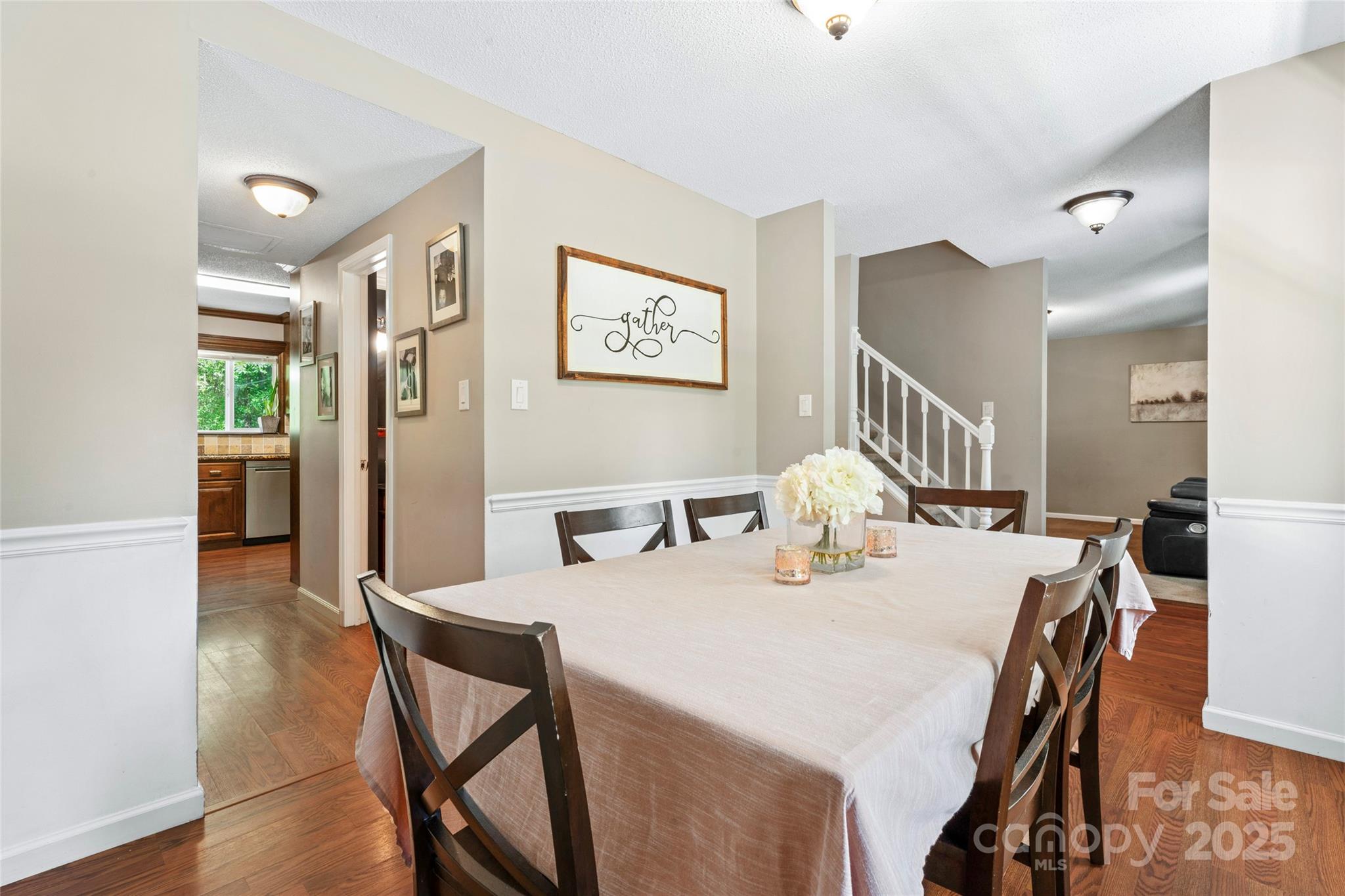 335 Bob White Run Salisbury, NC 28147 - Photo 7 of 41 a view of a dining room with furniture and wooden floor