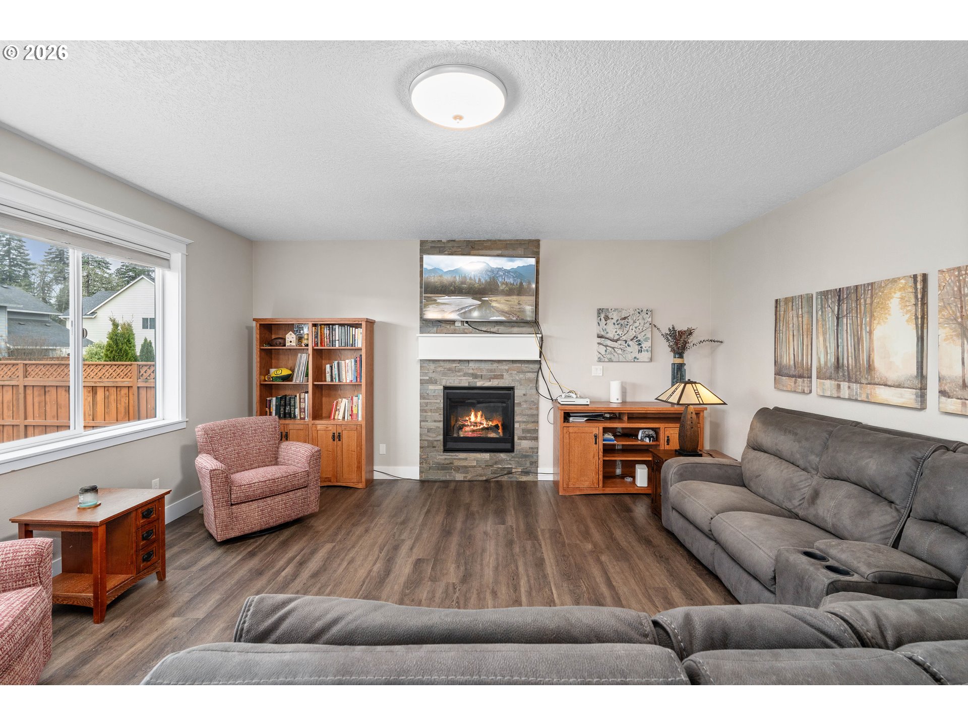 2958 Southwest Redmond Hill Road McMinnville, OR 97128 - Photo 14 of 40 a living room with furniture and a fireplace