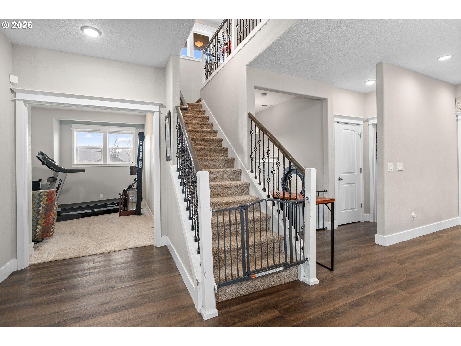 2958 Southwest Redmond Hill Road McMinnville, OR 97128 - Photo 18 of 40 a view of a livingroom with wooden floor and stairs