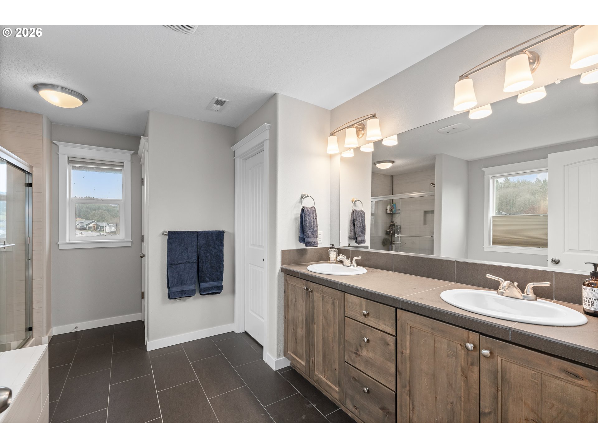 2958 Southwest Redmond Hill Road McMinnville, OR 97128 - Photo 22 of 40 a bathroom with a sink and a mirror