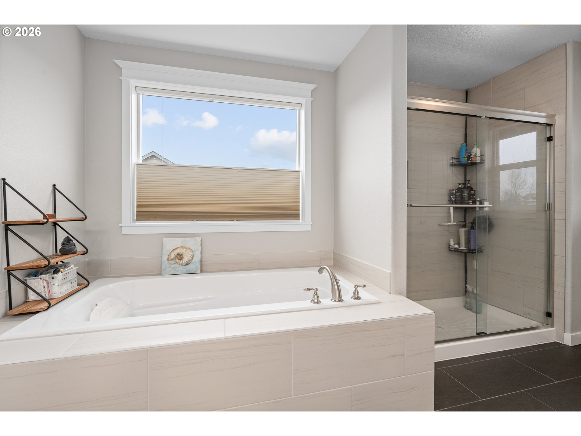 2958 Southwest Redmond Hill Road McMinnville, OR 97128 - Photo 24 of 40 a bathroom with a tub sink and mirror