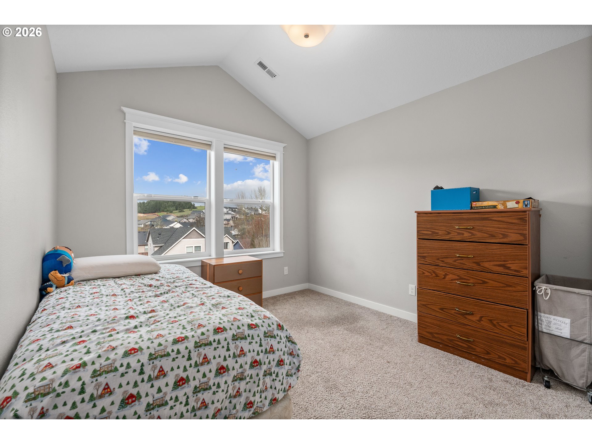 2958 Southwest Redmond Hill Road McMinnville, OR 97128 - Photo 27 of 40 a bedroom with a bed and a window