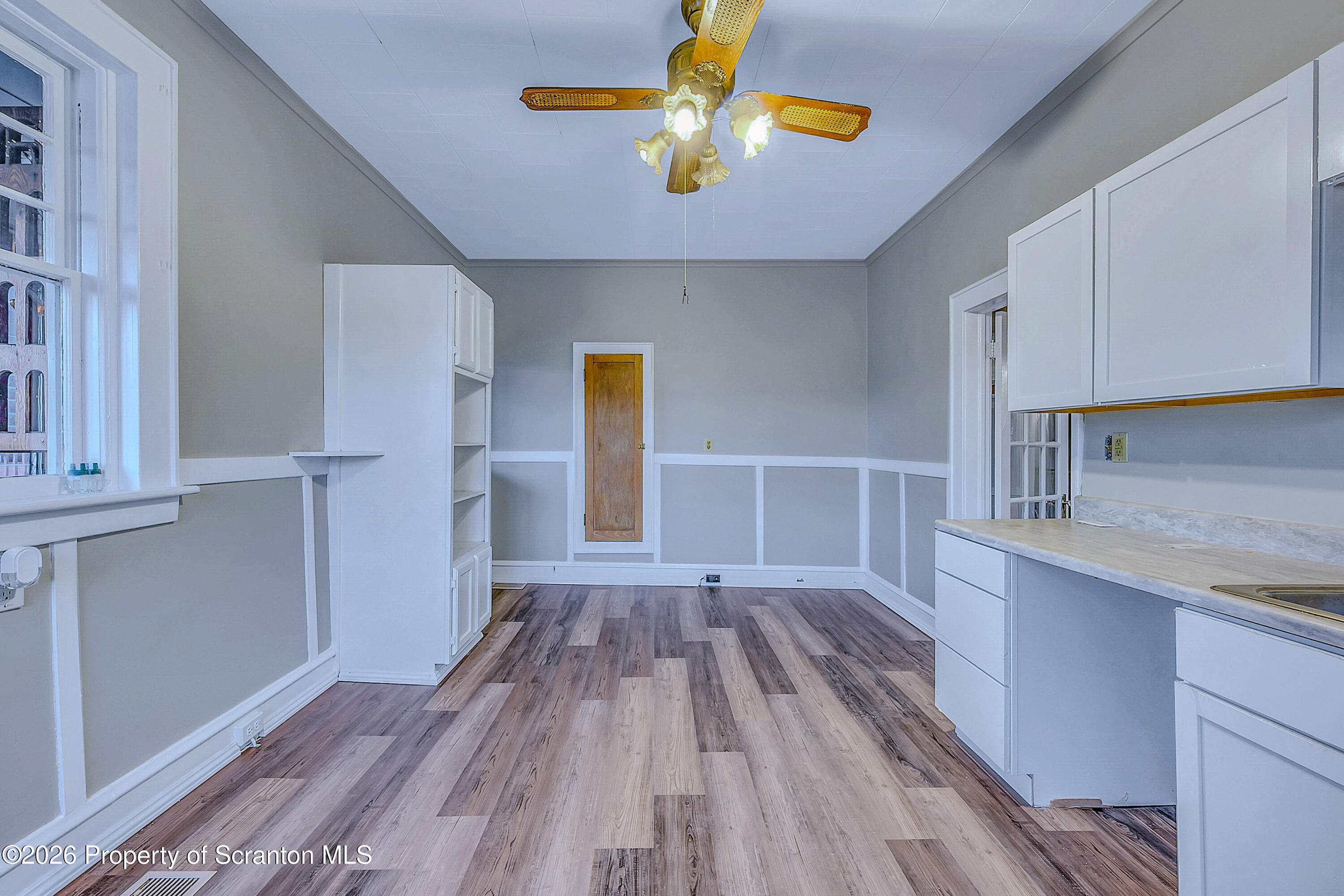 714 Smith Street Dunmore, PA 18512 - Photo 3 of 15 a view of kitchen and wooden floor