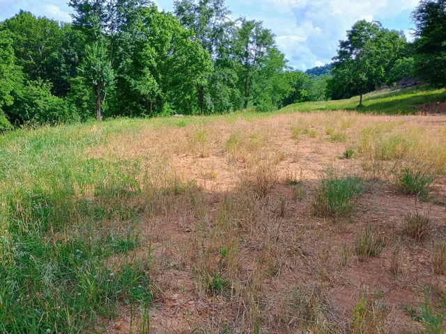 a view of parking garage with cars