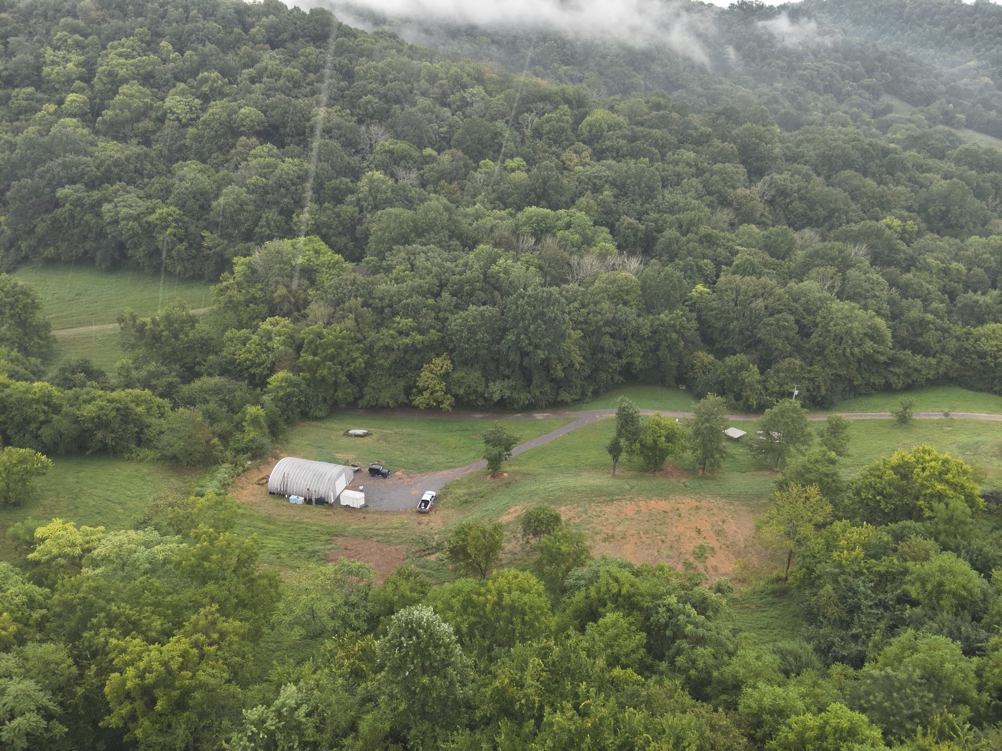 2847 Sorrells Road Petersburg, TN 37144 - Photo 26 of 28 a view of a lake with a mountain