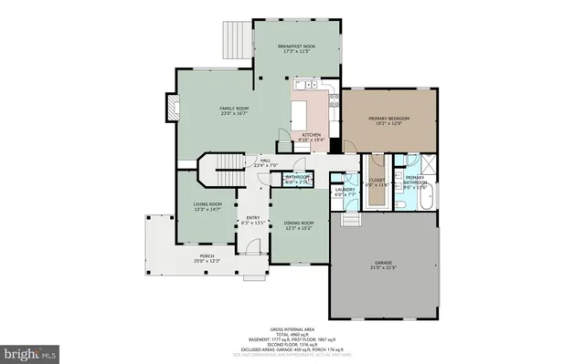 an aerial view of a house with garden space and street view