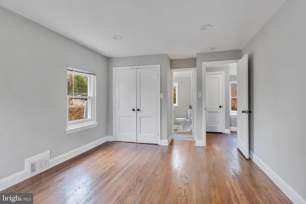 a view of entryway with wooden floor