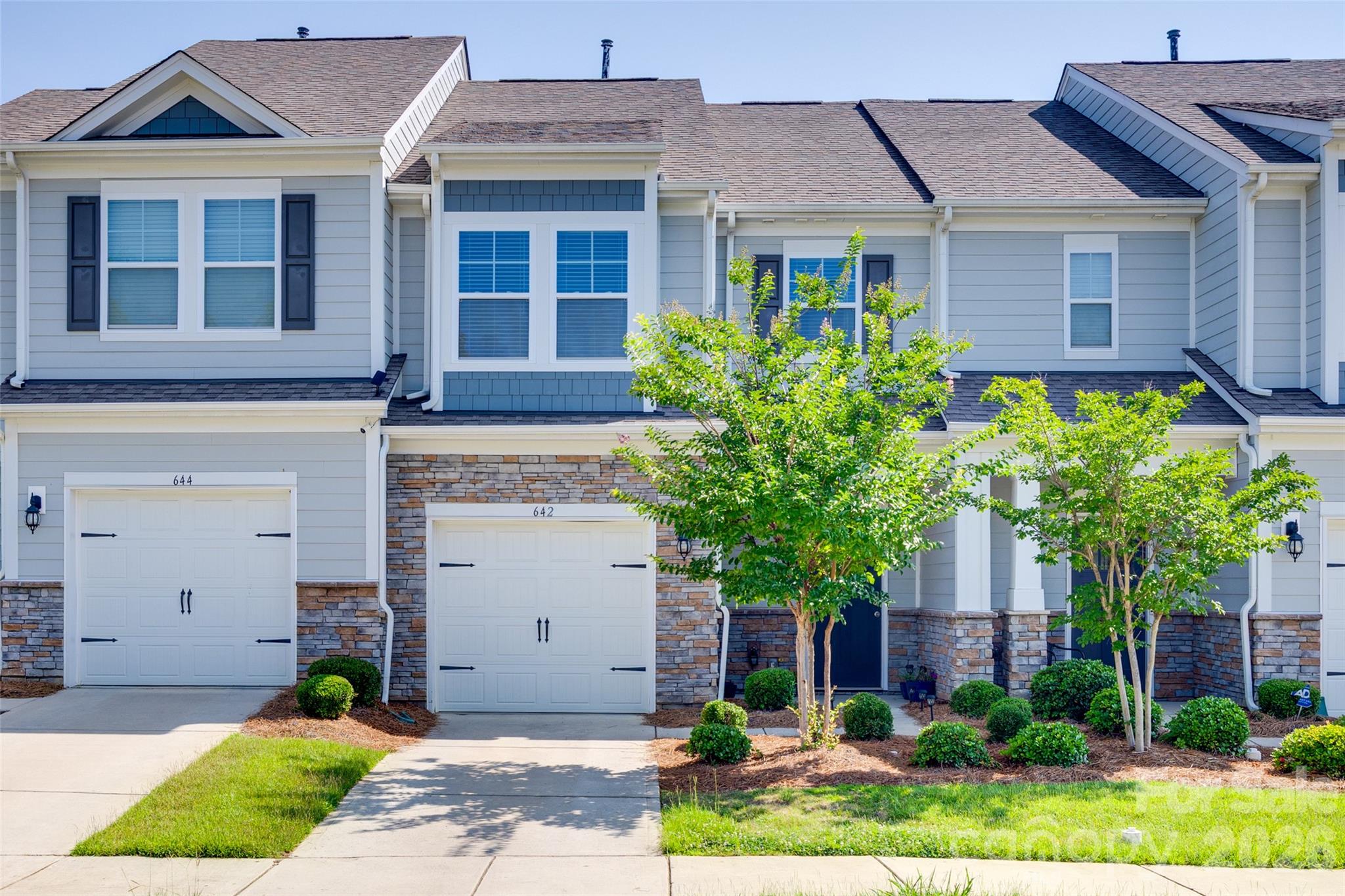 642 Altamonte Drive Clover, SC 29710 - Photo 1 of 41 a front view of a house with garden