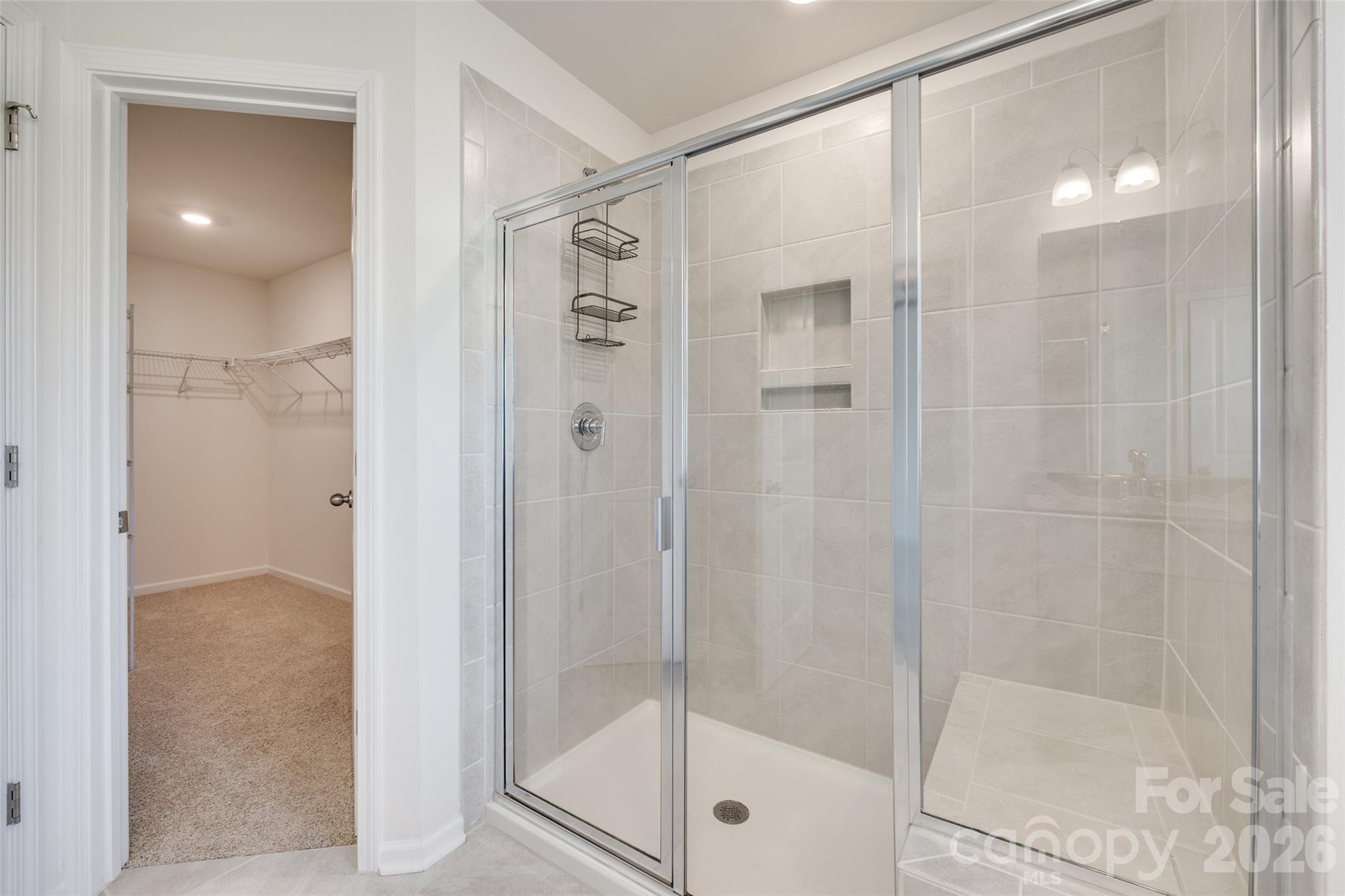 642 Altamonte Drive Clover, SC 29710 - Photo 12 of 41 a bathroom with a glass shower door