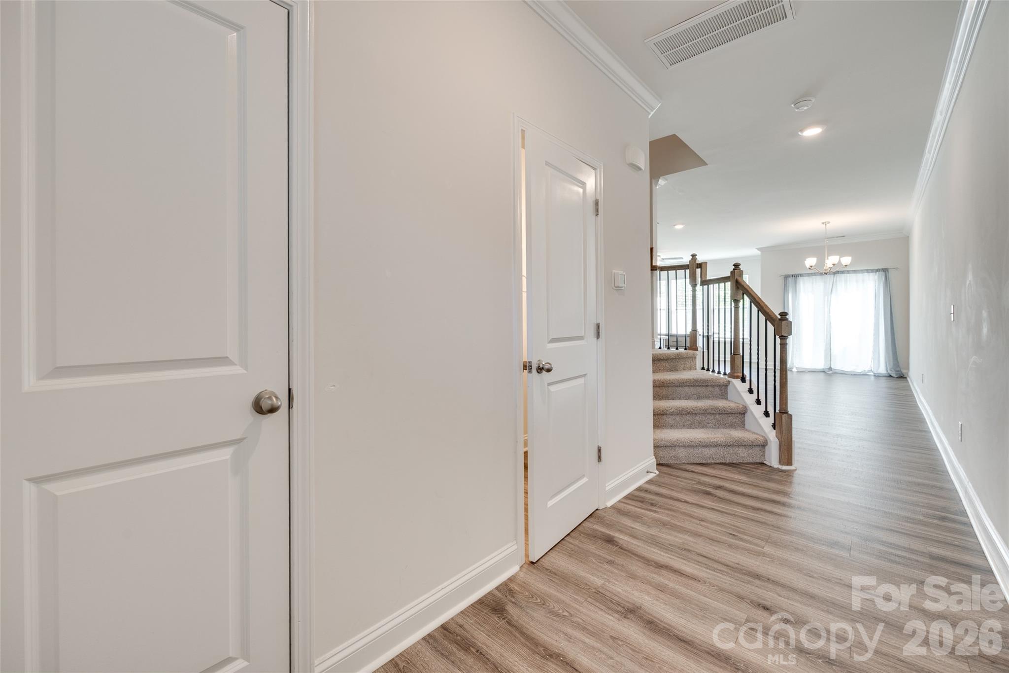 642 Altamonte Drive Clover, SC 29710 - Photo 21 of 41 a view of a hallway with wooden floor