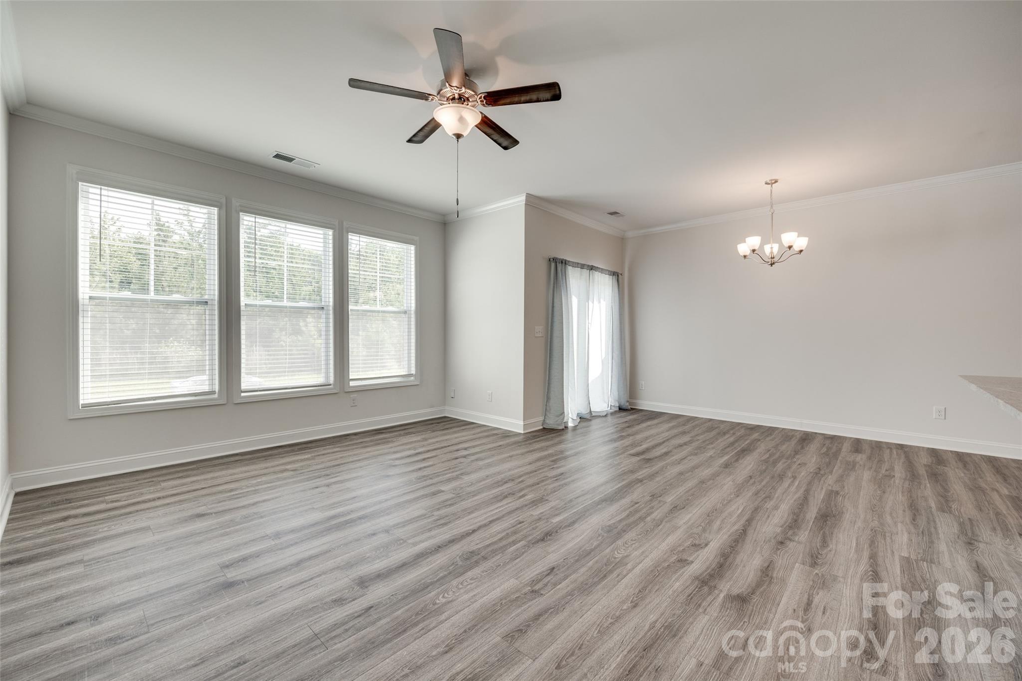 642 Altamonte Drive Clover, SC 29710 - Photo 41 of 41 a view of an empty room with wooden floor and a window