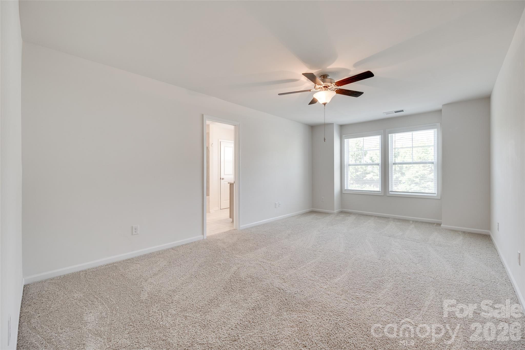 642 Altamonte Drive Clover, SC 29710 - Photo 5 of 41 wooden floor in an empty room with a window