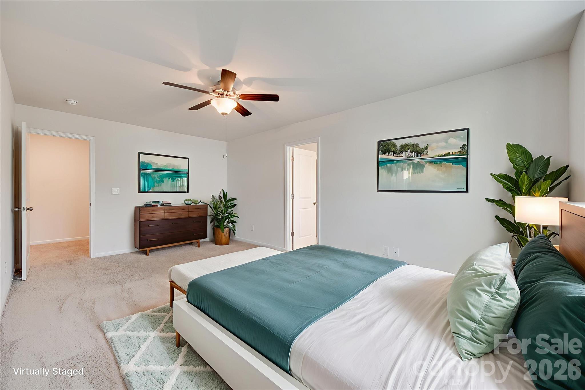 642 Altamonte Drive Clover, SC 29710 - Photo 6 of 41 a bedroom with a large bed and a chandelier