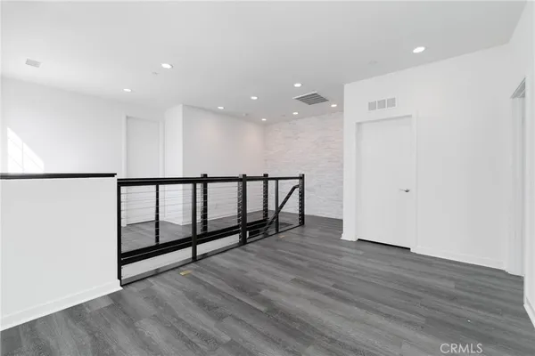 a bed room with a bed and a couch