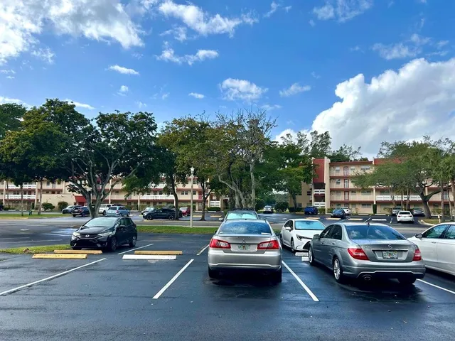 a view of the street with cars