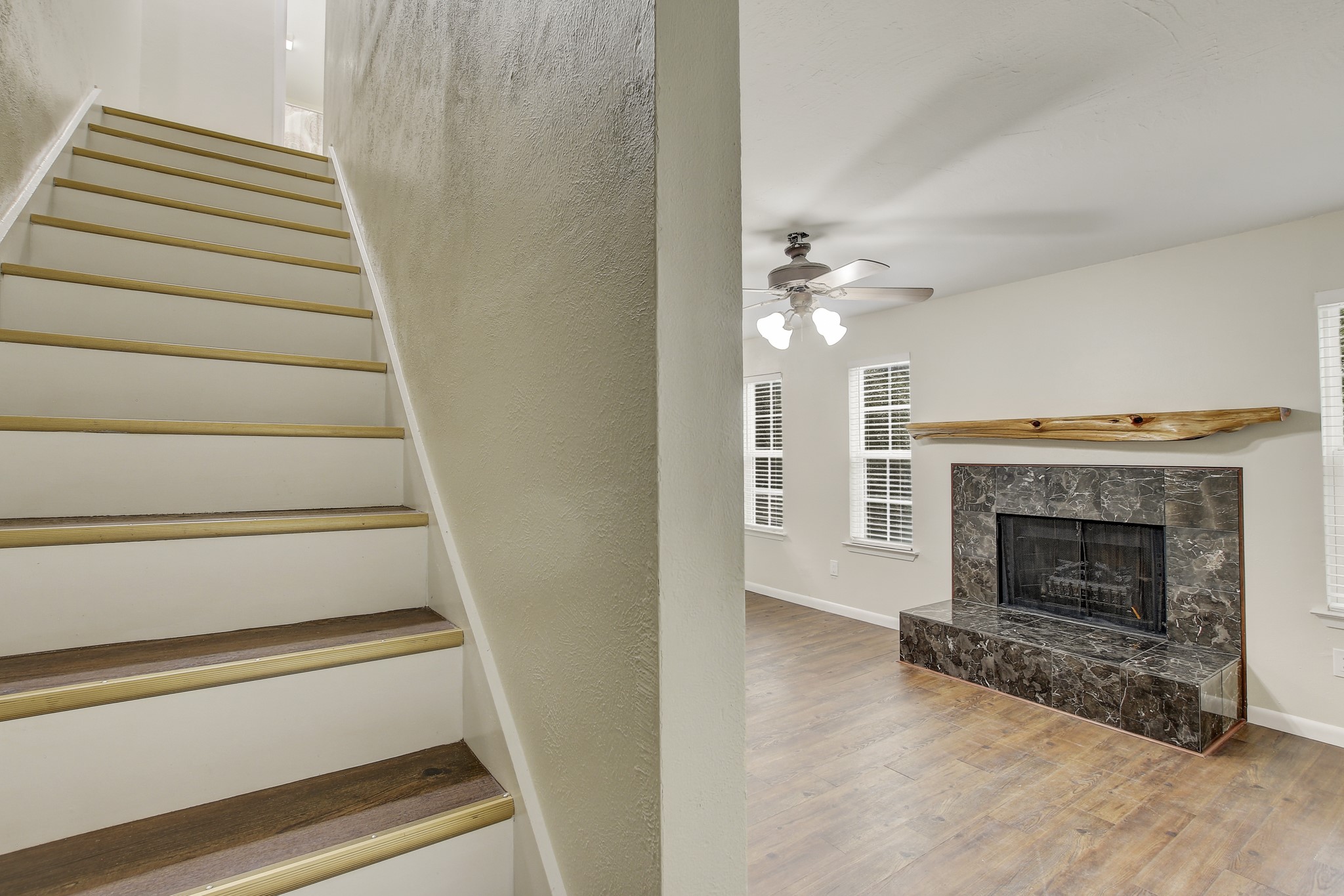 6902 Rifle Bend Austin, TX 78736 - Photo 18 of 33 a view of a livingroom with a fireplace