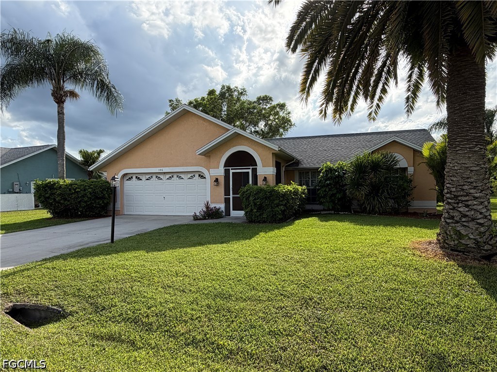 546 Whispering Wind Bend Lehigh Acres, FL 33974 - Photo 1 of 23