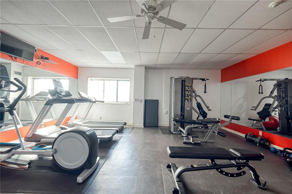 5 Bayard Road, Unit 309 Pittsburgh, PA 15213 - Photo 16 of 19 a room with gym equipment and mirror