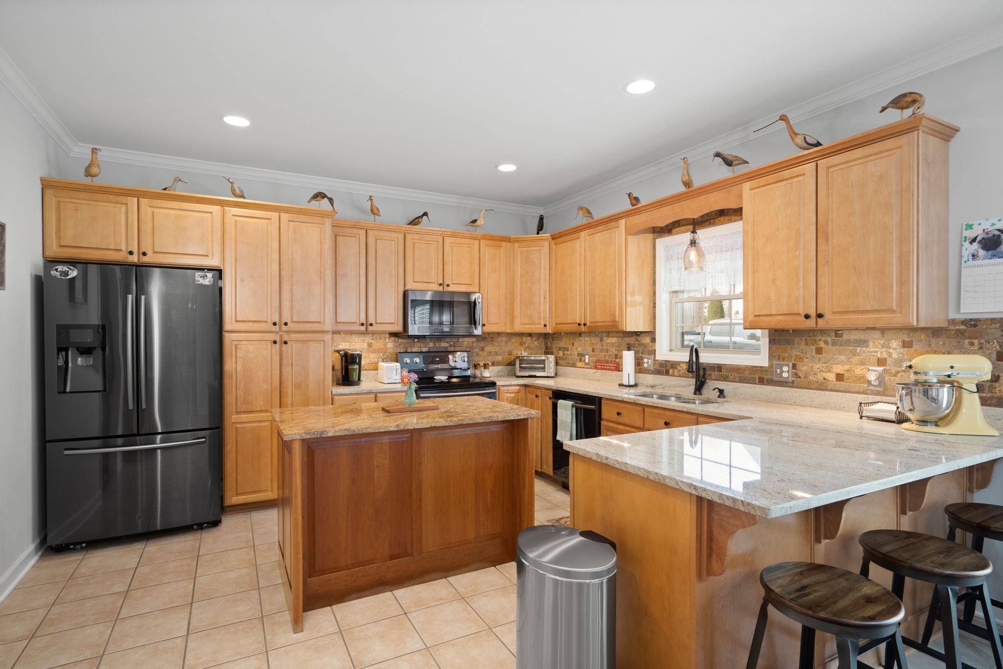 3008 Burts Crossing Springfield, TN 37172 - Photo 17 of 45 a kitchen with a sink a counter top stainless steel appliances and cabinets