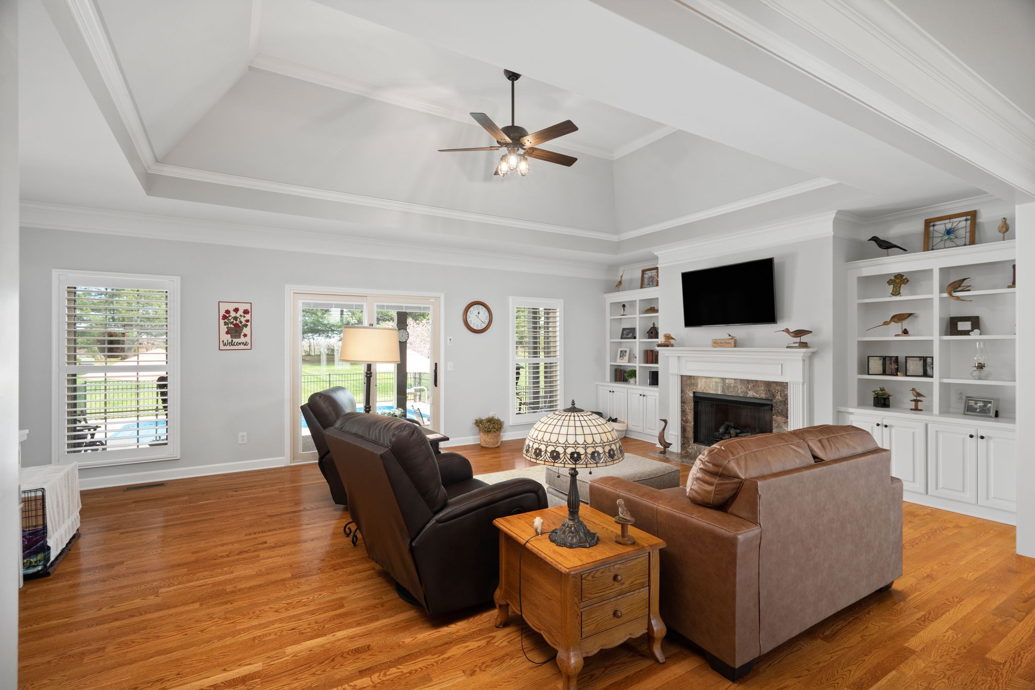 3008 Burts Crossing Springfield, TN 37172 - Photo 9 of 45 a living room with furniture a fireplace and a flat screen tv