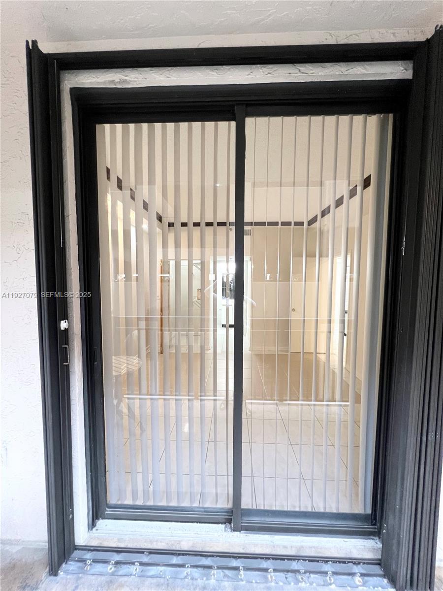 540 Brickell Key Drive, Unit 214 Miami, FL 33131 - Photo 14 of 48 a view of a black door