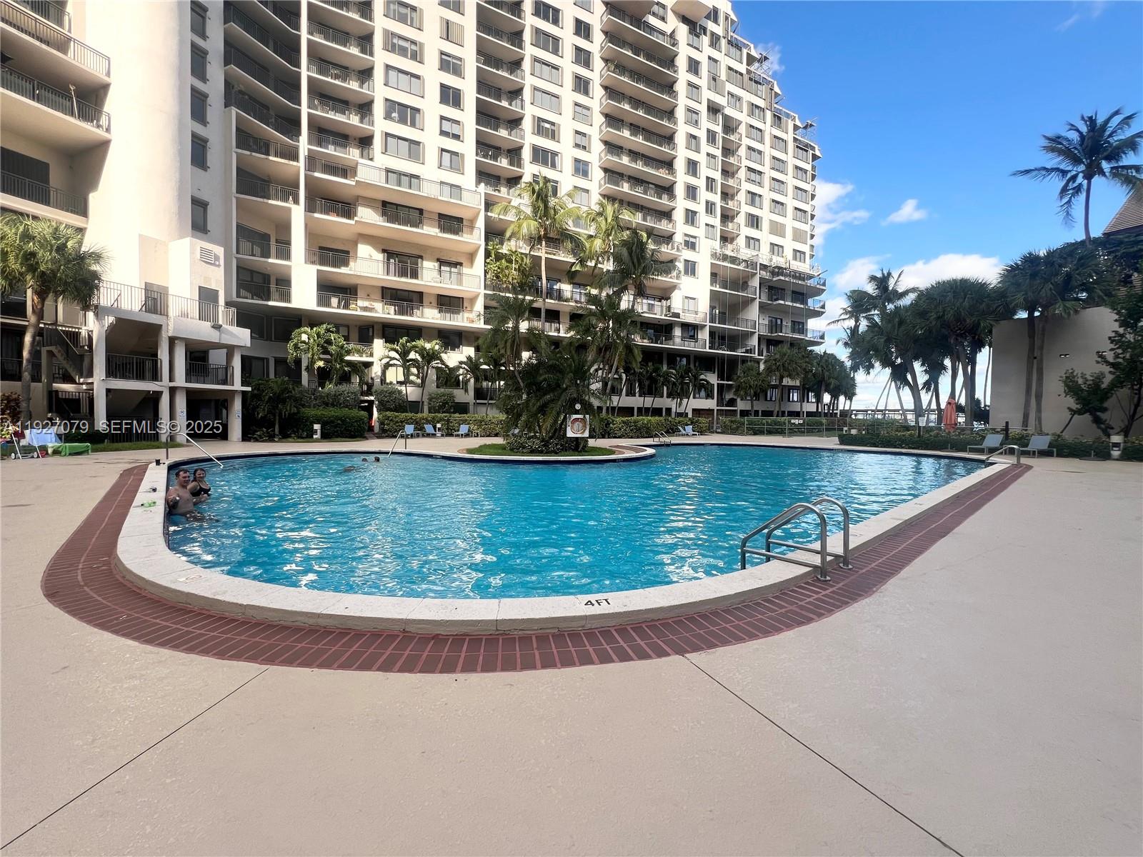 540 Brickell Key Drive, Unit 214 Miami, FL 33131 - Photo 35 of 48 a view of swimming pool