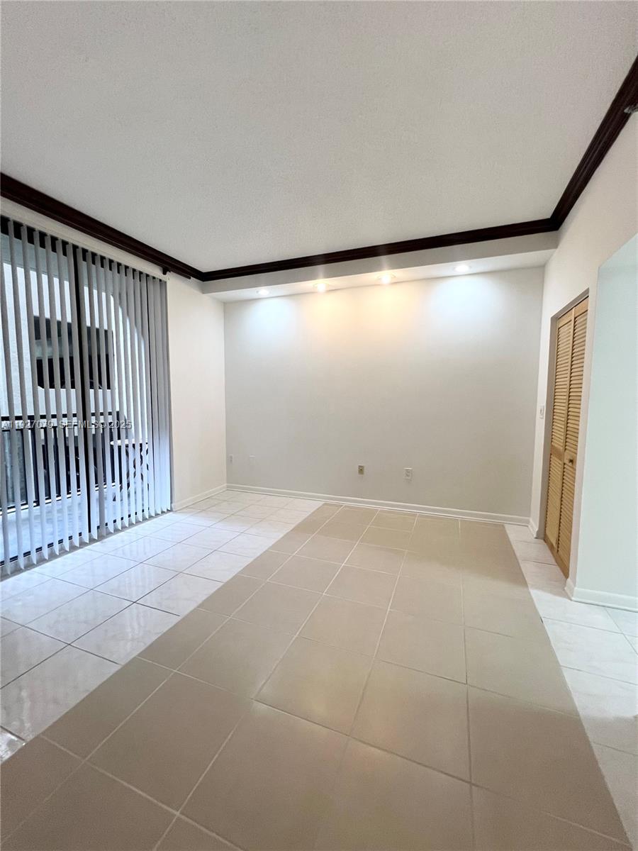 540 Brickell Key Drive, Unit 214 Miami, FL 33131 - Photo 5 of 48 a view of an empty room with a window