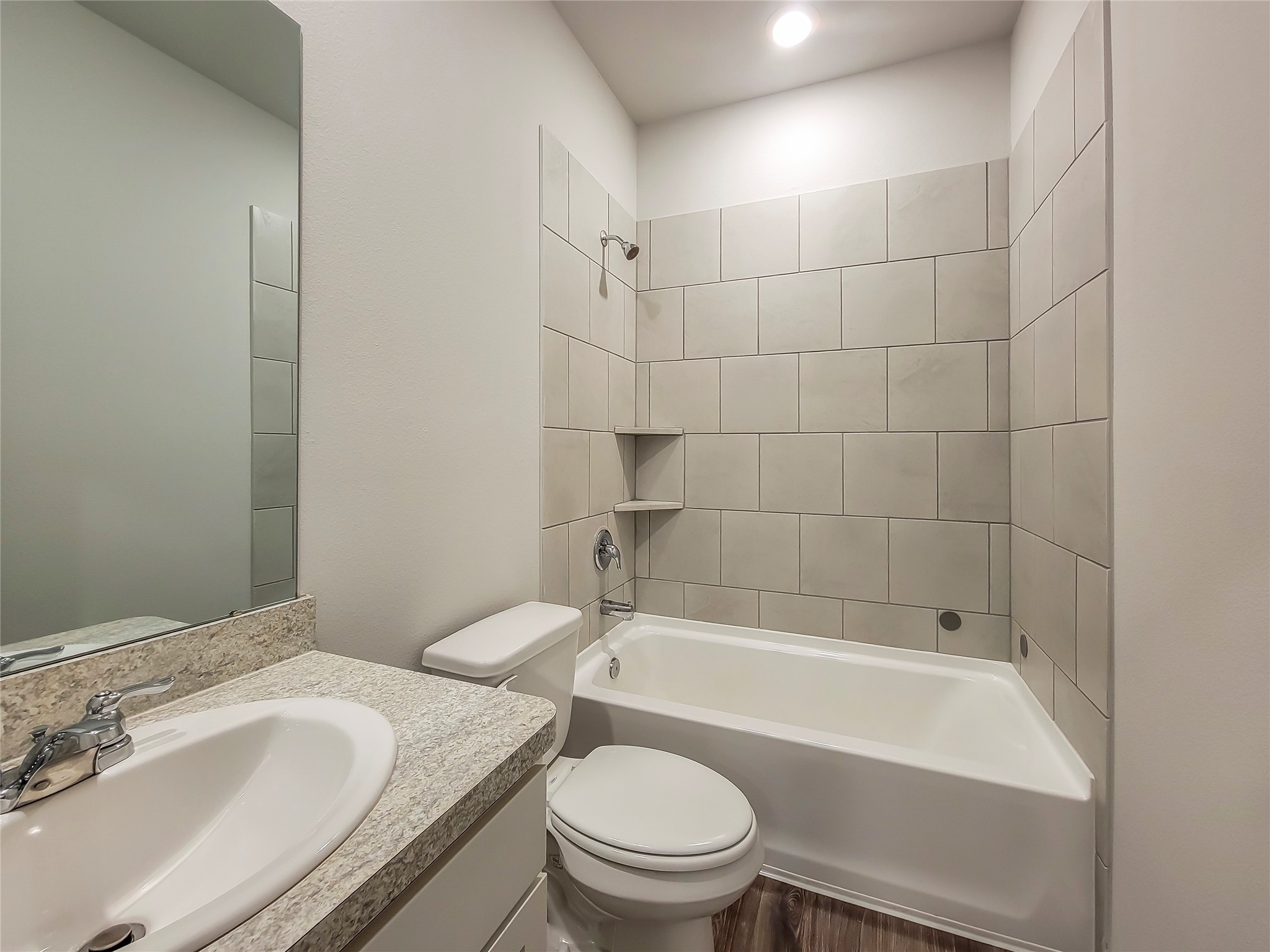 16983 Pandora Way Porter, TX 77365 - Photo 12 of 17 a bathroom with a bathtub toilet and sink