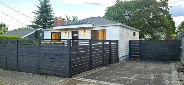 a front view of a house with a garage