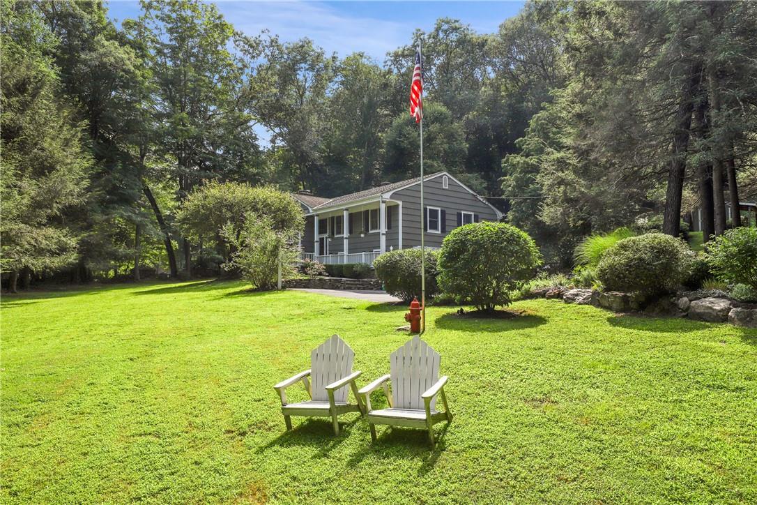 a house with garden in front of it