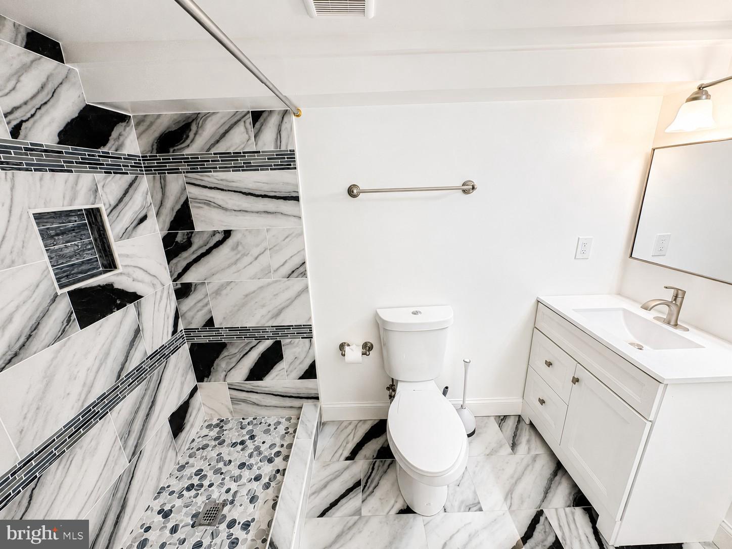 1610 Federal Street Baltimore, MD 21213 - Photo 23 of 27 Elegant marble bath retreat.
