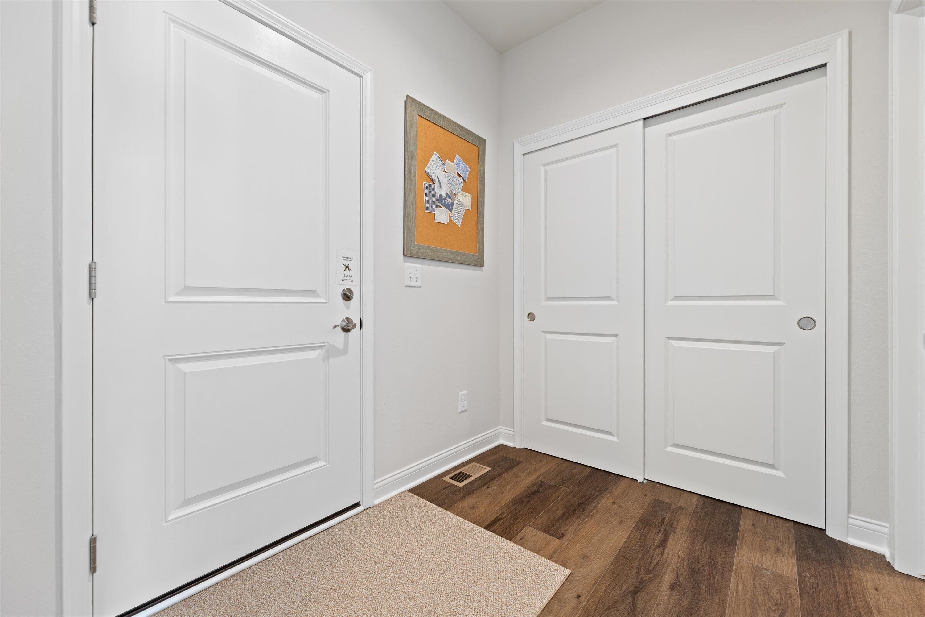 327 Sandy Circle Pewaukee, WI 53072 - Photo 32 of 36 Rear Foyer and Garage Entry