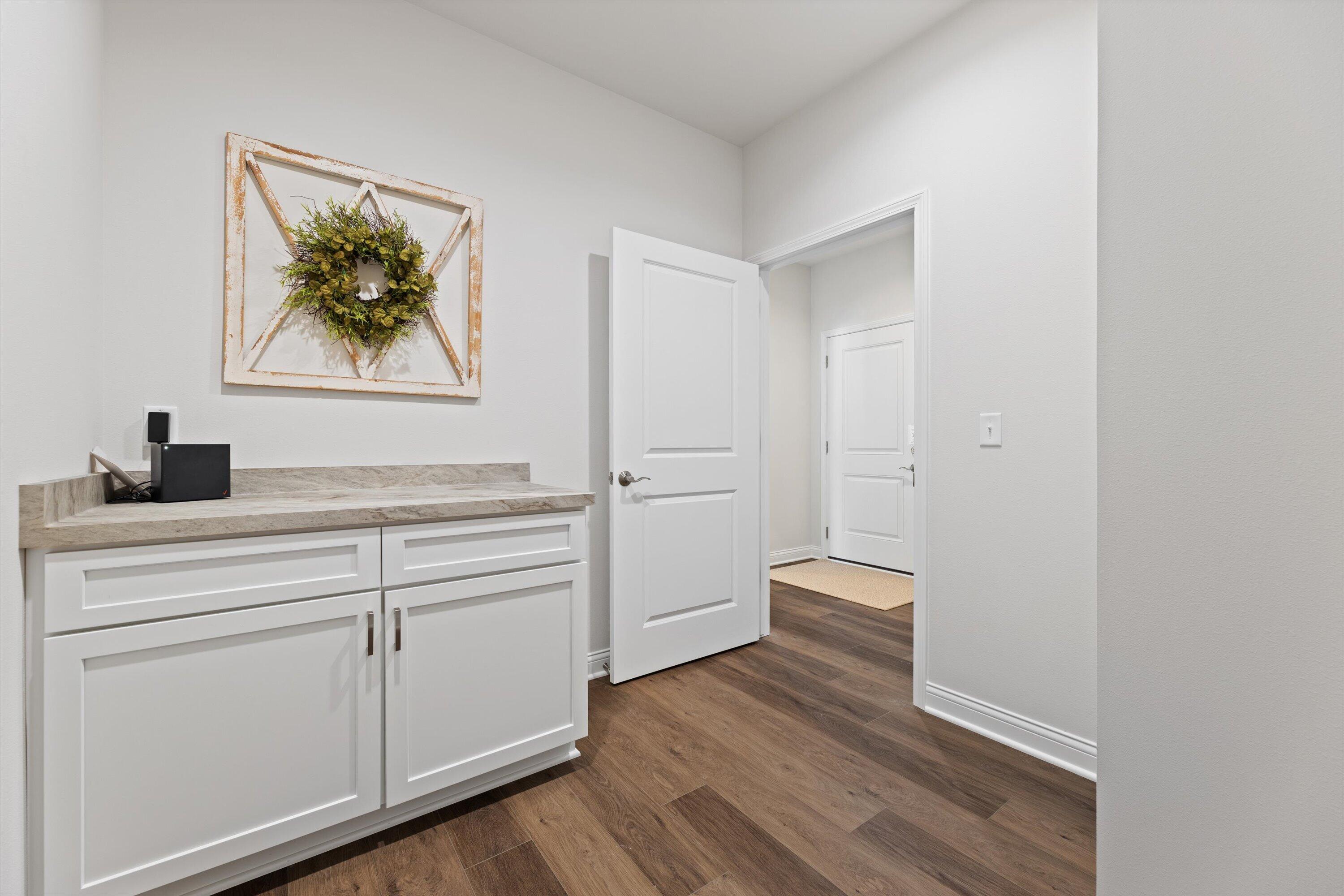 327 Sandy Circle Pewaukee, WI 53072 - Photo 33 of 36 Utility Room w/Cabinets
