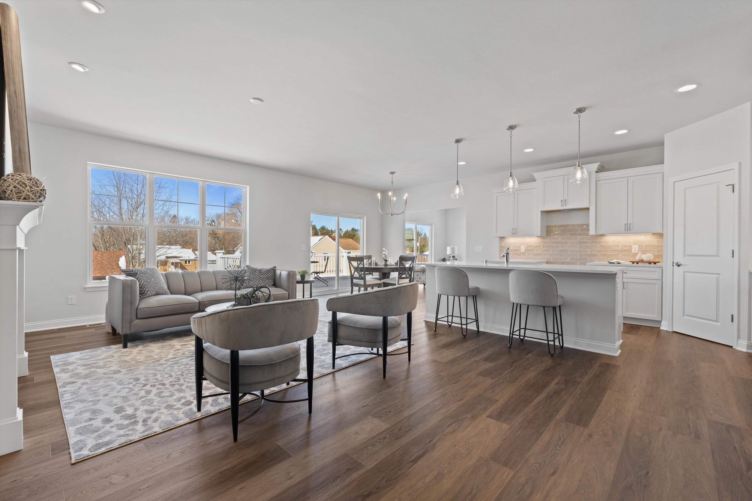 327 Sandy Circle Pewaukee, WI 53072 - Photo 9 of 36 Great room w island view