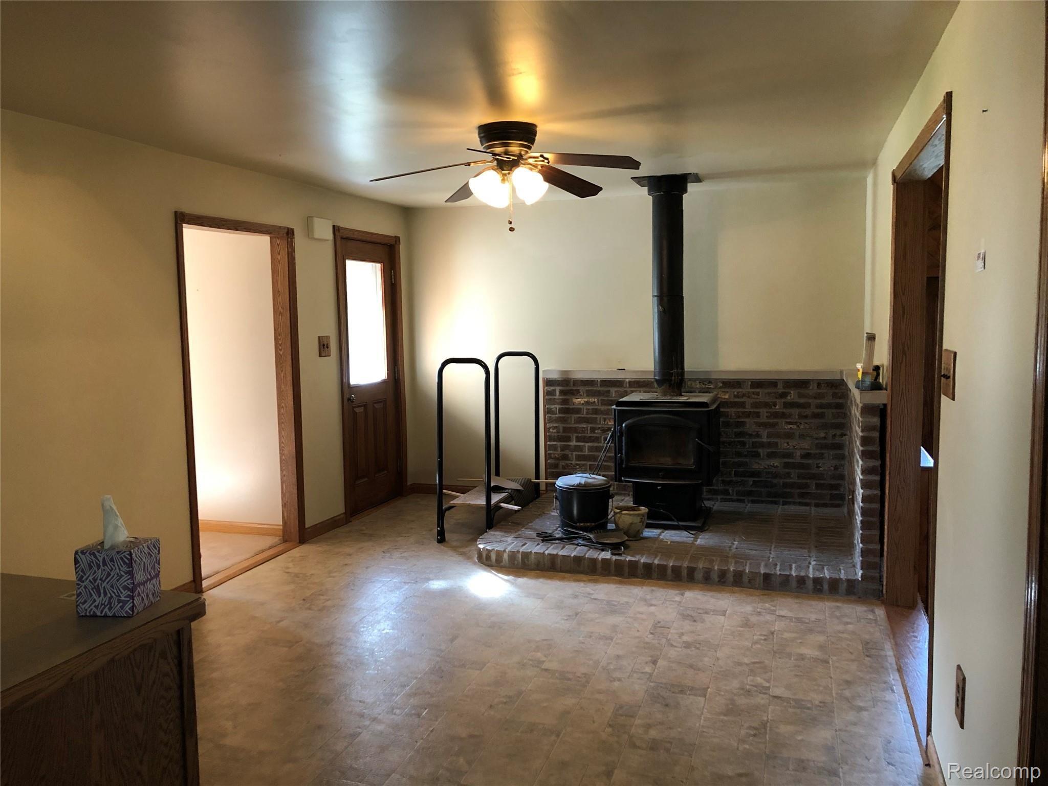 5664 Secord Lake Road Dryden, MI 48428 - Photo 30 of 48 WOOD STOVE