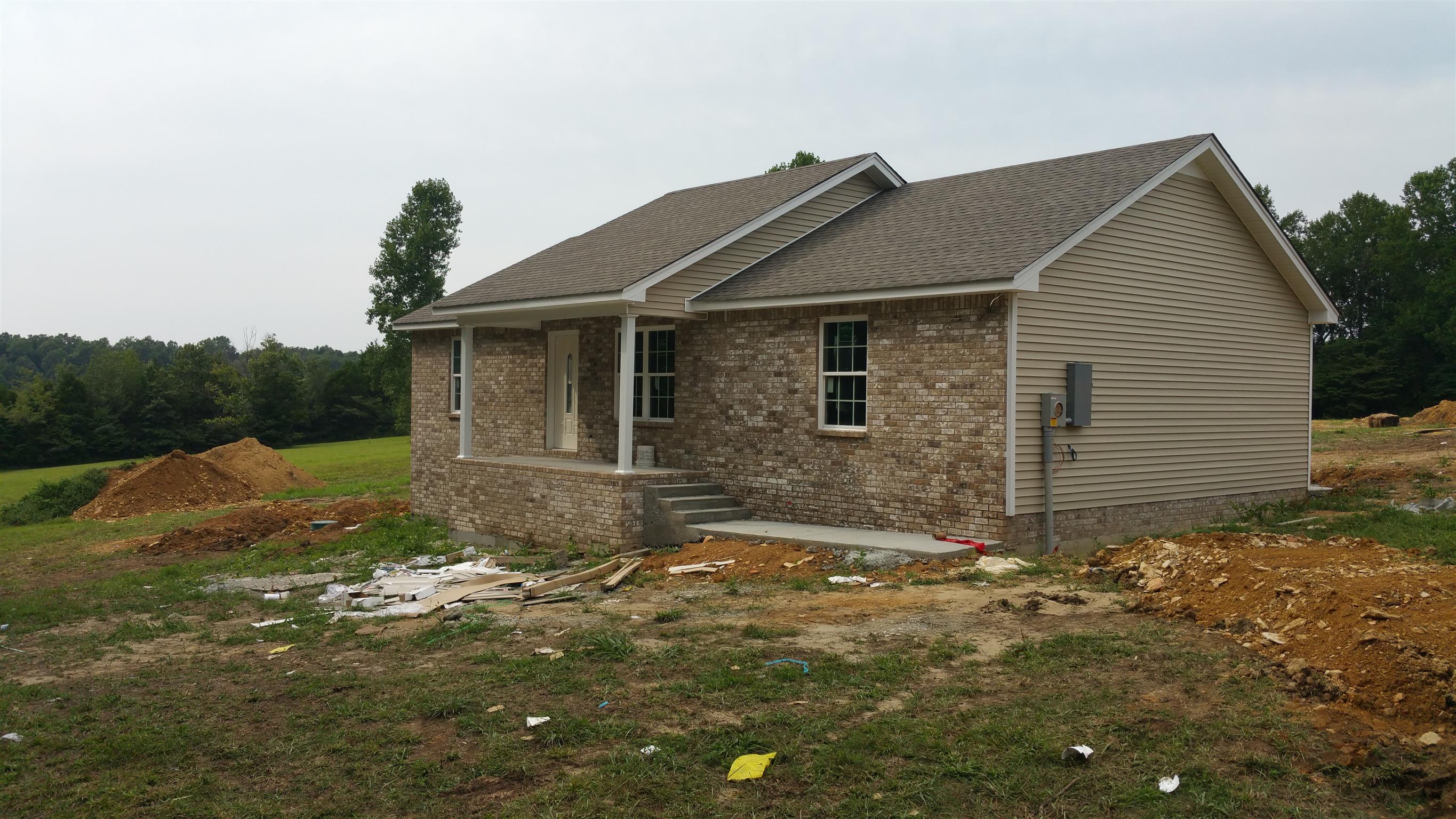 1219 East Ab Wade Road Portland, TN 37148 - Photo 1 of 3 a view of a house with yard